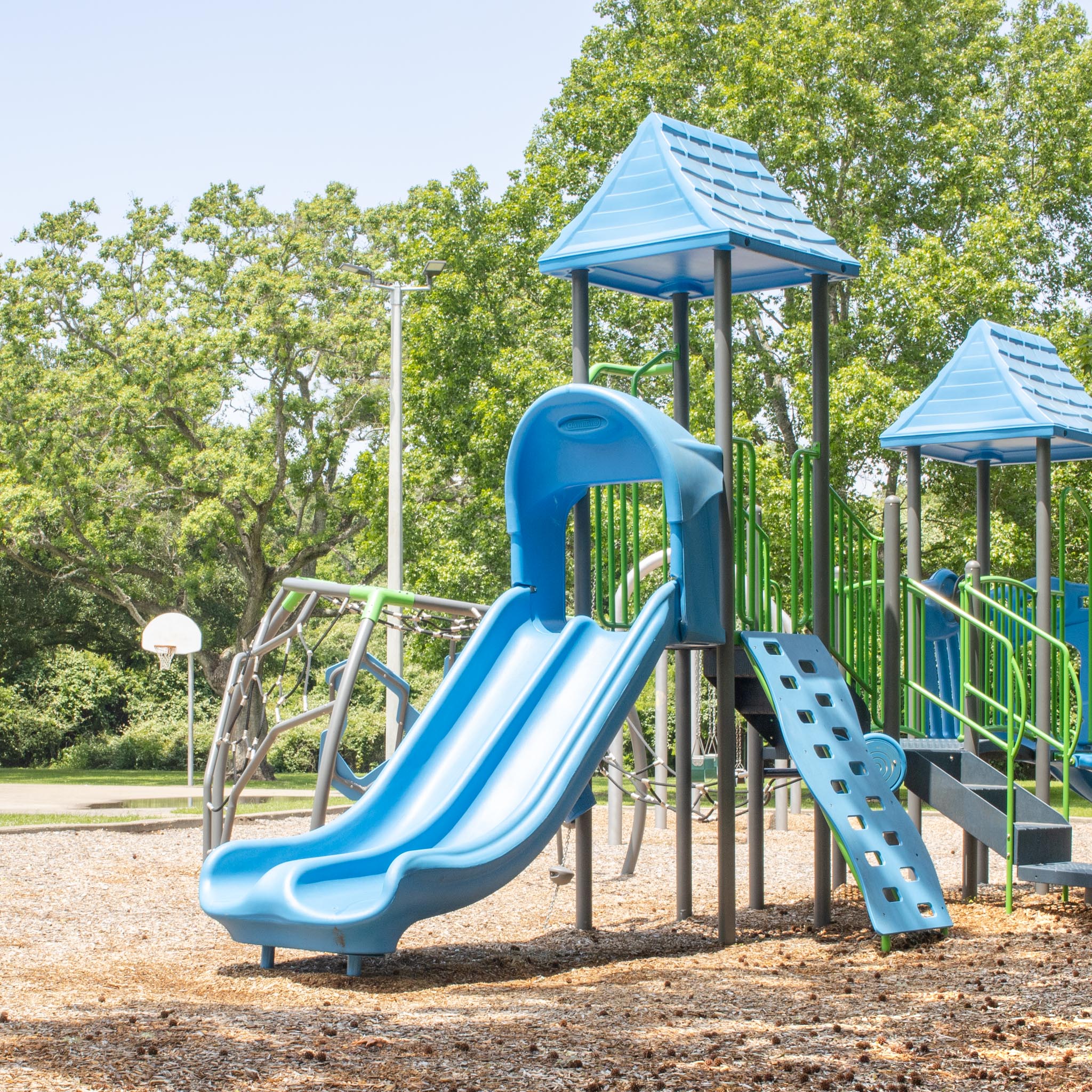 Barkuloo Park Playground and a basketball court in the background