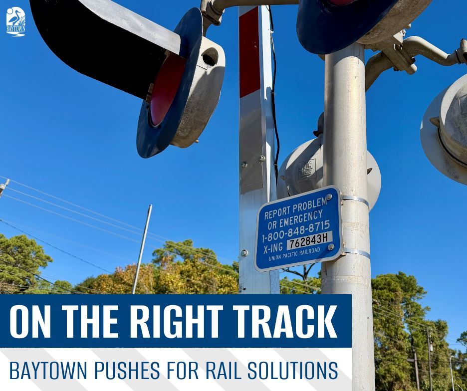 On the Right Track: Baytown Pushes for Rail Solutions. Railroad crossing depicted