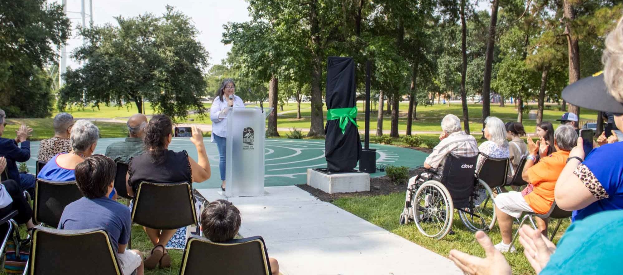 a crowd gathered for the dedication of the Community Center Labyrinth