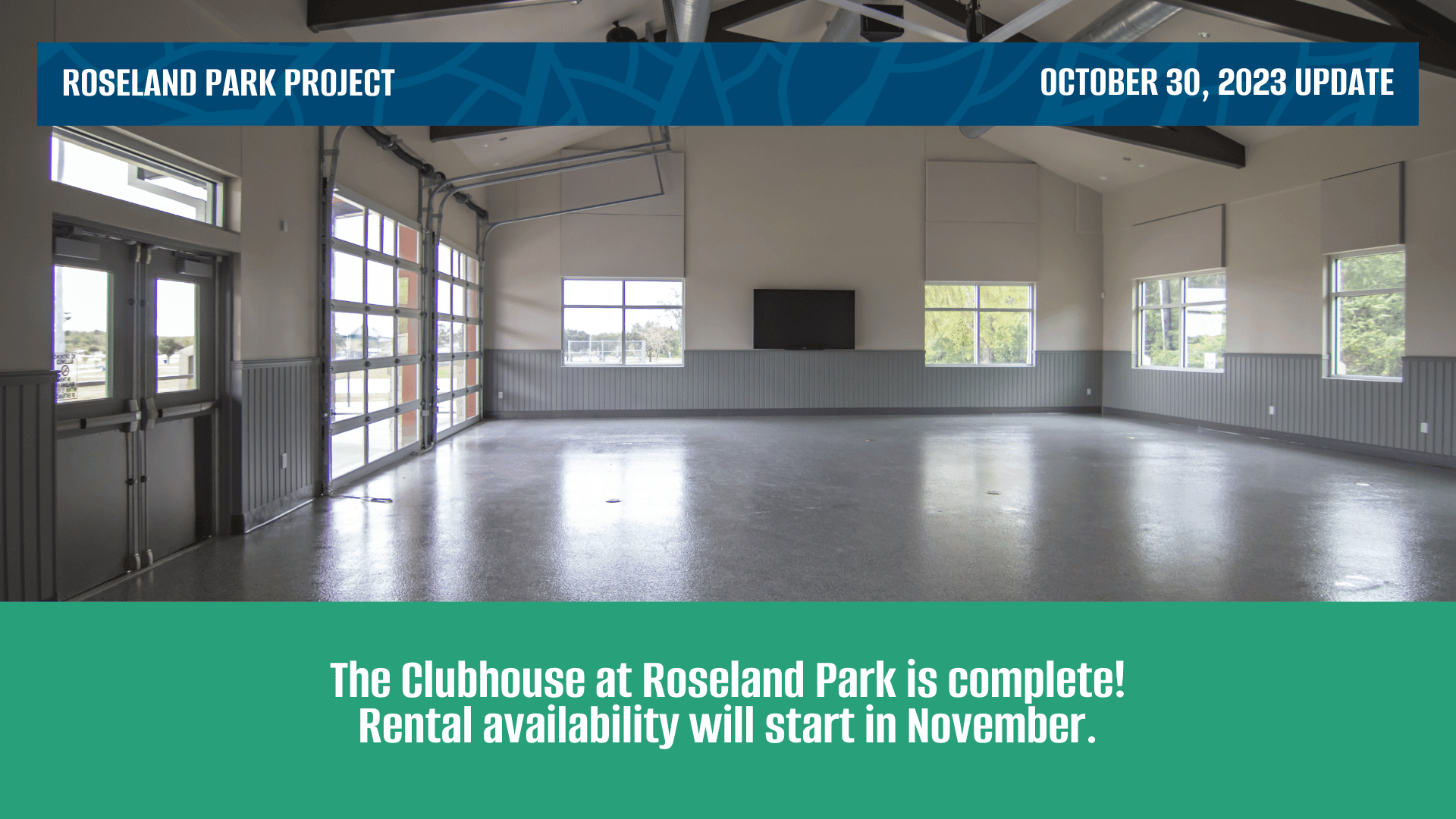 Interior of the Clubhouse at Roseland Park. Large open room with a large screen TV and windows